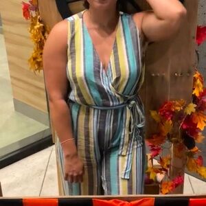 Lulus jumpsuit in linen.  NWT Blue green and turquoise striped.  Wrap style top.